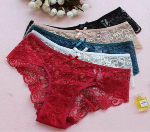 Vita bassa Lingerie sexy Donna Intimo di pizzo Floreale Fiocco nodo Mutandine trasparenti Slip Donna Abbigliamento volontà e sabbia Drop Ship3562650