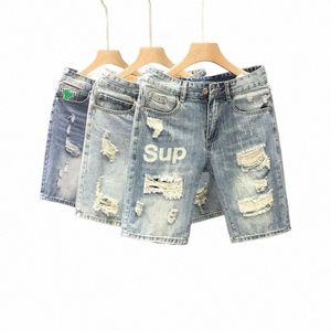 FI Luxurious Men's Slim Jeans för Summer FI med den distriktiga designern och snygga rippade hål Shorts Q2JC#