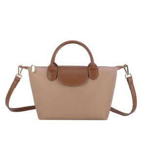 Магазин сумочки Оптовая розничная женская сумка 2024 Новая мода большая мощность контрастная мягкая кожаная рука