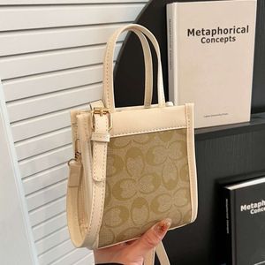 A loja exporta bolsas de grife atacado portátil pequeno saco quadrado elegante mini tote piano pontuação telefone de compras ombro único crossbody