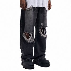 Kolano rozerwane dżinsy Rozproszone jeansy z szerokiej nogi dżins