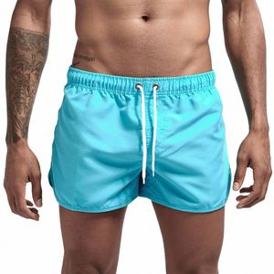 Mens Beach Shorts 2024 Hot Sale Male Seaside Casual Fi Surfing Shorts High Quality Gym Sports Solid Color Short Pants 98RW#