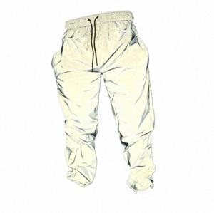 Refleksyjne spodnie Mężczyźni 2020 marka hip hop taneczne fluorescencyjne spodnie swobodne harajuku noc sportowe spodni szary plus size k1ei#