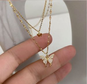 Designer smycken dubbelskiktad fjäril, inlagd diamant lycka klöver kvinnors halsband, benben kedja, personligt tillbehör