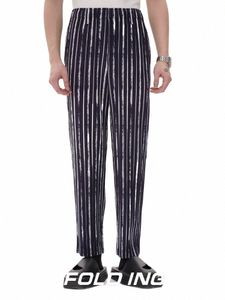Miyake plissado cintura alta listrado calças impressas elásticas manga reta calças casuais masculinas fi roupas masculinas streetwear m3cK #