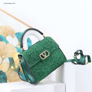 Designer handväskor för kvinnor kvinnor väska ny handhållen diagonal streck hög kvalitet