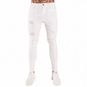 2023 Nya herr jeans hiphop vit moto mager rippade ren färg elastiska denim byxor manlig midja midja jogging blyertsbyxor q85r#