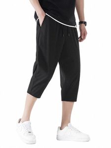 Mężczyzna 3/4 swobodne spodenki plus rozmiar 8xl Summer Krótkie mężczyzn Breczesy Oddychające chłodzenie nyl spandeksu Spandex Lose Capris Pants Z84p#