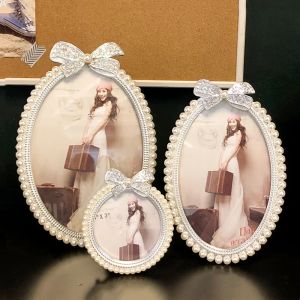 Frame Metal Oval Photo Frame Crystal Bow Pearl Photo Storage Display Wedding Decorations Picture Frame Baby Picture Frames Decor