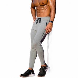 męskie joggery swobodne fitn tracki mężczyźni menswear dressit dna chude dresowe presy fi hip hop spodnie 201021 t4di#