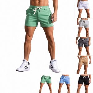 Summer Casual Sport Shorts Men Szybkie sucha kieszonkowa botki na siłownię jogging bieganie na plażę fitn szorty męskie ubrania marki 4xl 68yf#