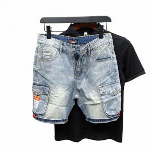 Summer 2023 Nowe luksusowe szorty męskie Koreańskie dżinsy streetwearu z projektantami duże kieszenie ładunkowe dżinsowe spodenki M5qu#