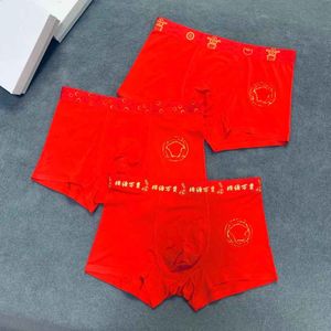 I più popolari Red Lucky Moment del 2024 Mutande di design Pantaloncini Ragazzi Intimo di seta di ghiaccio Estate Uomo Boxer senza cuciture Ultra sottile Allentato traspirante Marea Boxer di marca Corto