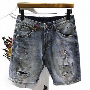 Graffiti Men street denim shorts koreansk versi trend rak knälängd fempunkt byxor rippade hål lösa jeans shorts man c53h#