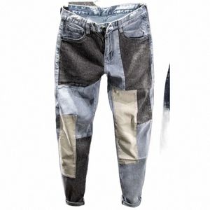 Koreańskie versi patchwork dżinsy Mężczyźni Nowa persality Fi Slim Feet Patch Patch Cloth Streetwear Pants Dżinsy Hombre Męskie odzież B3CS#