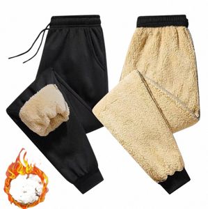 Zimowe spodnie z polarami grube ciepłe spodnie termiczne mężczyźni Fitn sznurka