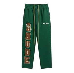 Pantaloni sportivi Rhude nero verde albicocca Uomo Donna 1 Pantaloni casual ricamati con asciugamano sciolto Pantaloni multitasche Jogger06