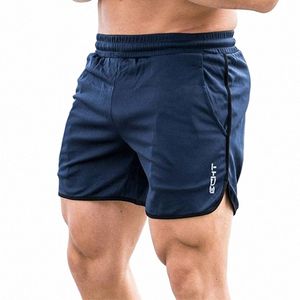 2021 Mens Gym Training Shorts Homens Esportes Roupas Casuais Fitn Workout Running Grid Quick-Secagem Compri Shorts Atletismo X3Ov #