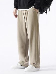 Zimowe grube polarowe ciepłe spodnie dresowe mężczyzn streetwear szerokopasmowa prosta luźne spodnie na torze męskie zwykłe upałę termiczne 240318