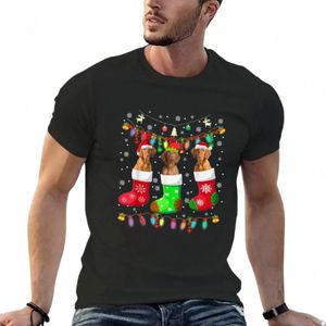 vizsla Dogs In Christmas Socks Vizsla Lover Gifts T-Shirt fãs de esportes gráficos sublimes camisetas pesadas para homens g2UD #