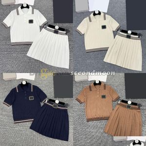 Tvådelt klänning preppy stil veckad kjol kvinnor kort ärm stickade knitkläder lapel halskunnor över våren sommarparty outfit släpp leverans en otqr3