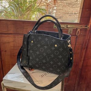 En kaliteli lüks tasarımcılar çanta çantaları montignne çanta kadınlar tote marka mektubu kabartma gerçek deri omuz crossbody çantaları