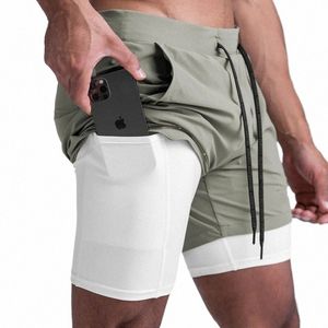 Gymohyeah 2 i 1 shorts män som kör shorts snabb torr träning jogging fitn kort atletisk man som kör svettbyxor med fickor k6rn#