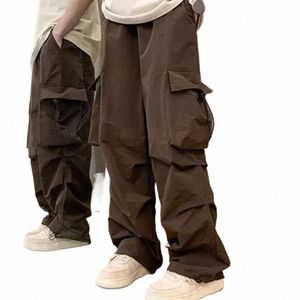düz fit pantolon güçlendirilmiş cep dikişleri sokak tarzı erkek kargo pantolonları çok cepli gevşek kalça q9um için elastik bel#