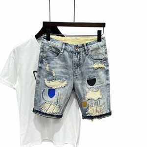 Nowy przyjazd 2023 Summer Wed Men's Casual Denim Shorts Stylowe kot Whiskercowboy Zagryped Zabrane załatane chude krótkie dżinsy 79fv#