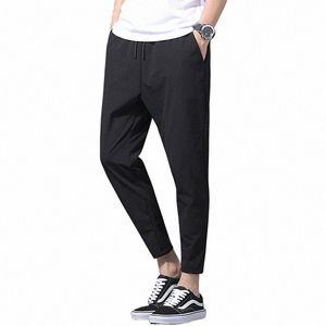 2024 NYA KOREAs ICE SILK ELASTIC BOBERER Fyra SEAS TUN CASUAL HERRENS LOOK 9-POINT Stor storlek Small Foot Sports Pants Spring M0oc#