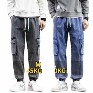 Męskie dżinsy z ładunkiem w dużych rozmiarach Hip Hop Streetwear Wiele kieszeni rozciągnięte Cotw Casual Denim Spods workowate spodnie 8xl d1ir#