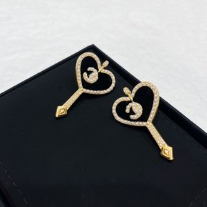 أقراط مصممة فاخرة جديدة للنساء 18K Gold Cupid's Love Sweet Elining