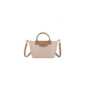 Mağaza Crossbody Bag Ucuz İhracat Stili Dumpling Womens Mini Kontrast Renk Çantası Eşsiz Niş Dign 2024 Yeni Versatile7rw7