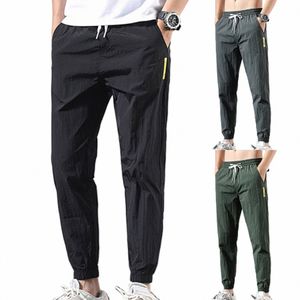 męskie spodnie ładunkowe Plus luźne dres do rozmiarów z wiązanymi stóp spodnie spodnie dresowe stroje panttal homtal b4l1#