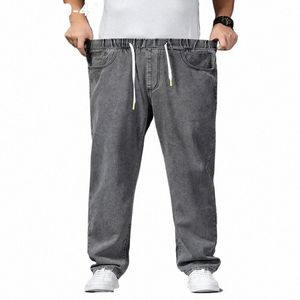 Tjock lår breda ben jeans för män hösten rak 140 kg sträckt grå denimbyxor elastisk midja plus storlek 42 46 manliga byxor m9fp#
