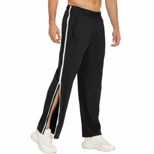 2023 Klädmän Zip Butt Splice Casual Away tårbyxor byxor basket Sweatpants med träning Masculinas Roupas Pockets H2IM#