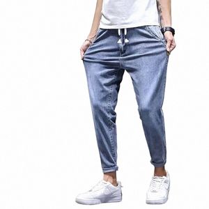 Elastisk snörning upp denim jeans män trend mångsidiga byxor 2022 Studenter tonåringar mäns japanska harem ben 2022 mäns lastbyxor 862y#