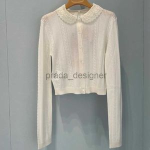 Designer kvinnors tröjor miui vit stickad skjorta handgjorda krokade krage tunn is silkes cardigan kappa mångsidig långärmad topp vår ny stil