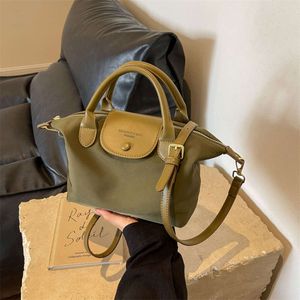 Bolsa de crossbody Bag Sacos de exportação baratos 2024 Primavera nova bolsa de moda colorida de mulher simples de alta qualidade58w