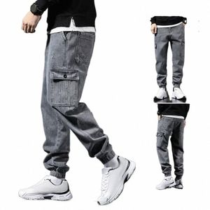 Wiosna Lato Spodnie Mężczyźni Streetwear Loose Denim Joggers Spodnie Multi Pockets Worbgy harem dżinsowe spodnie męskie spodnie dresowe l1tt#