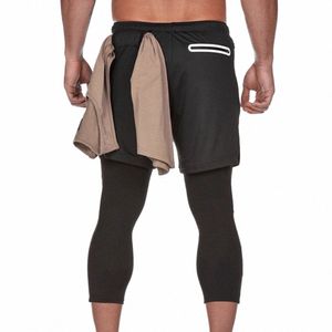 FI Frühling Sommer Sport Shorts Männliche Hosen Atmungsaktive Übung Fitn Gym Versteckte Tasche Neun Punkt Shorts B9WK #