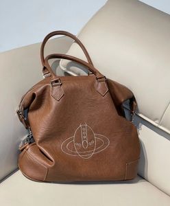 Mångsidig axel crossbody väska för kvinnors fashionabla och trendiga totes handväska högkvalitativa designväskor