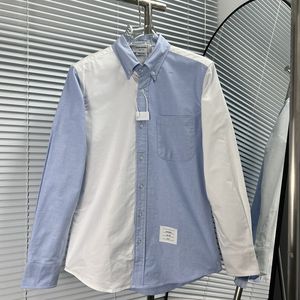 Ny minimalistisk Slim Fit Oxford Pure Cotton Shirt med vit och blå dubbel färgmatchning