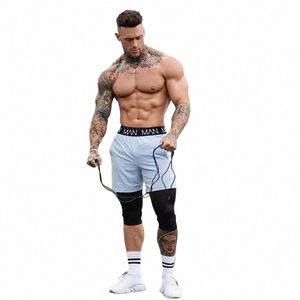 New Men Fitn Bodybuilding Shorts Man Letni trening siłowni Mężczyzna oddychający Szybki suchy sportowiec jogger krótkie spodnie M6LM#