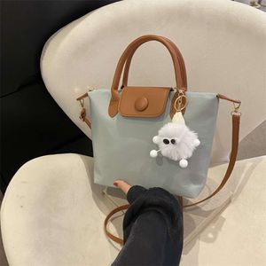 Factory Shoulder Bag Store Free Shipping 2024 Autumn New Tote Canvas Spliced Large Capacity One Underarm Fashion Small Cross Body0F3R