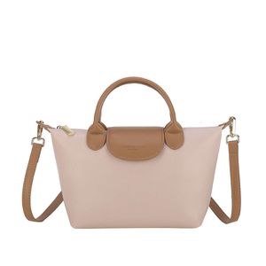 Factory Shoulder Bag Store Kostenloser Versand Große Kapazität für Damen 2024 Neue und vielseitige High-End-Feeling-Handtasche Crossbody DumplingNJUH