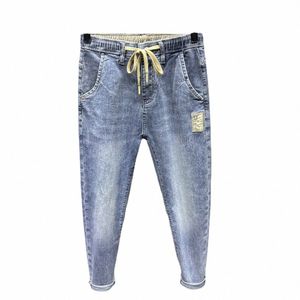 Nova primavera verão coreano fi homens jeans de luxo macacão elástico cordão carga wed roupas cônico baggy joggers calças 85jY #