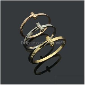 Manschettmärke klassiskt par t armband lyxplätering 18k guld designer för män mode enkla kvinnor armband rostfritt stål smycken dh03u