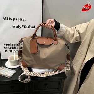 Źródło fabryczne Wysokiej jakości torebki to Oxford Cloth Fitness Bag Nowa moda i wypoczynek w kolorze Crossbody Lightweight