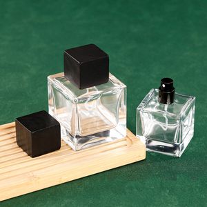 Bottiglie di profumo in vetro spesso quadrato stile semplice da 30 ml Bottiglie spray per profumo Slap-up Profumo con tappo nero per uomo